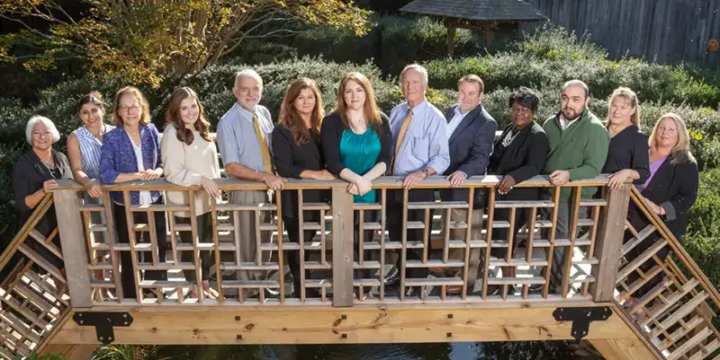 Baldwin, Briscoe, and Steinmetz Staff photo on a bridge-mobile.