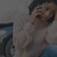 Young woman on the phone after a hit and run accident.